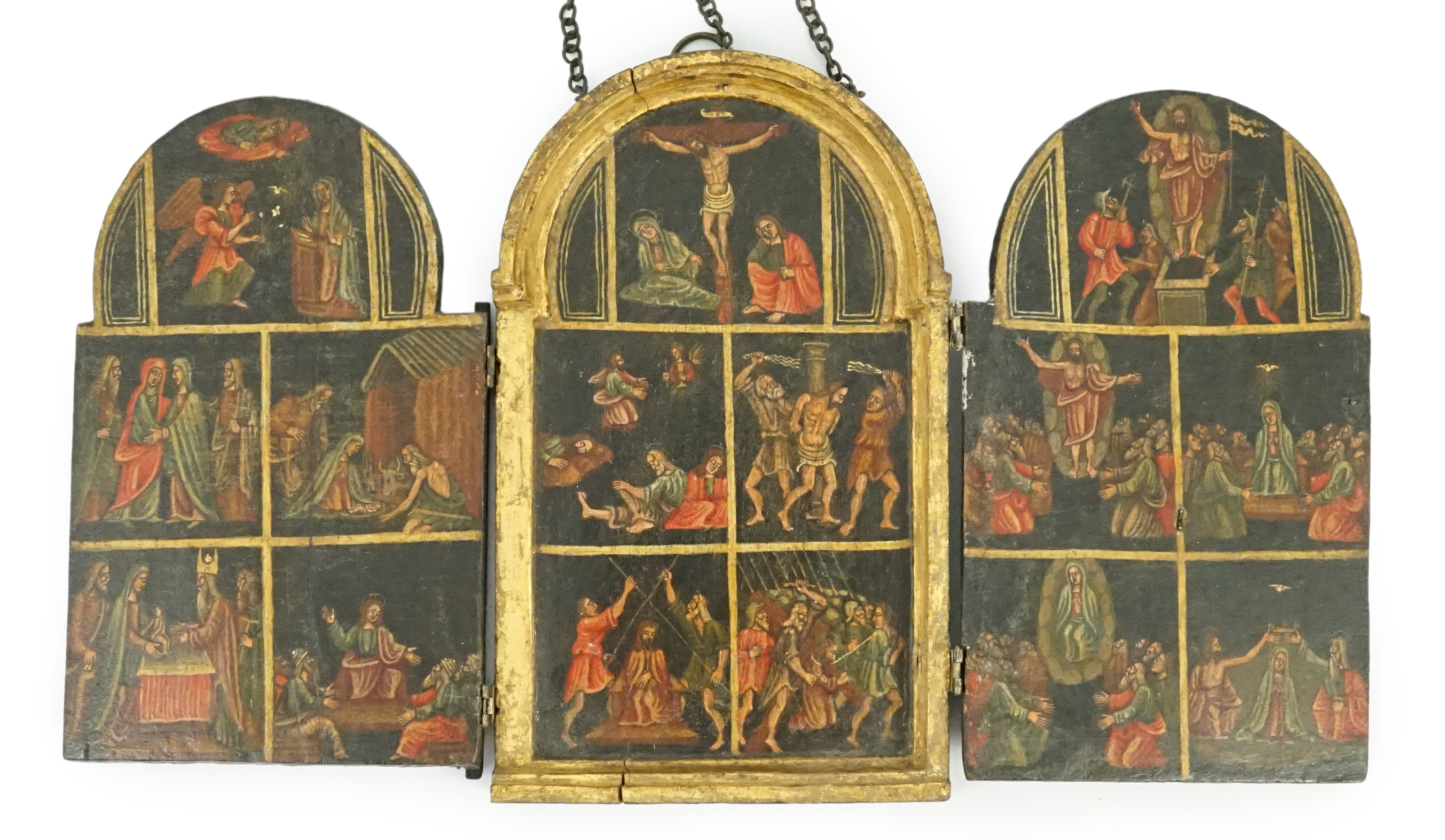 A 17th century triptych case, oil on wood, Icon depicting the life of Christ, with a Saint receiving stigmata on one of the two doors, 11.5cm wide, 18.75cm high, when opened out 33.5cm wide